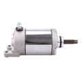 Starter motor assembly with silver housing, mounting bracket, and exposed drive shaft.