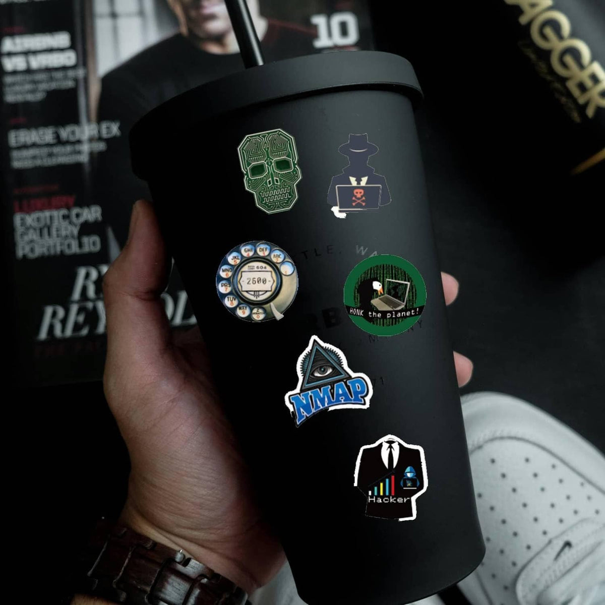 Hacker-themed stickers on a black tumbler with NMAP, hacker cat, and green chip icons