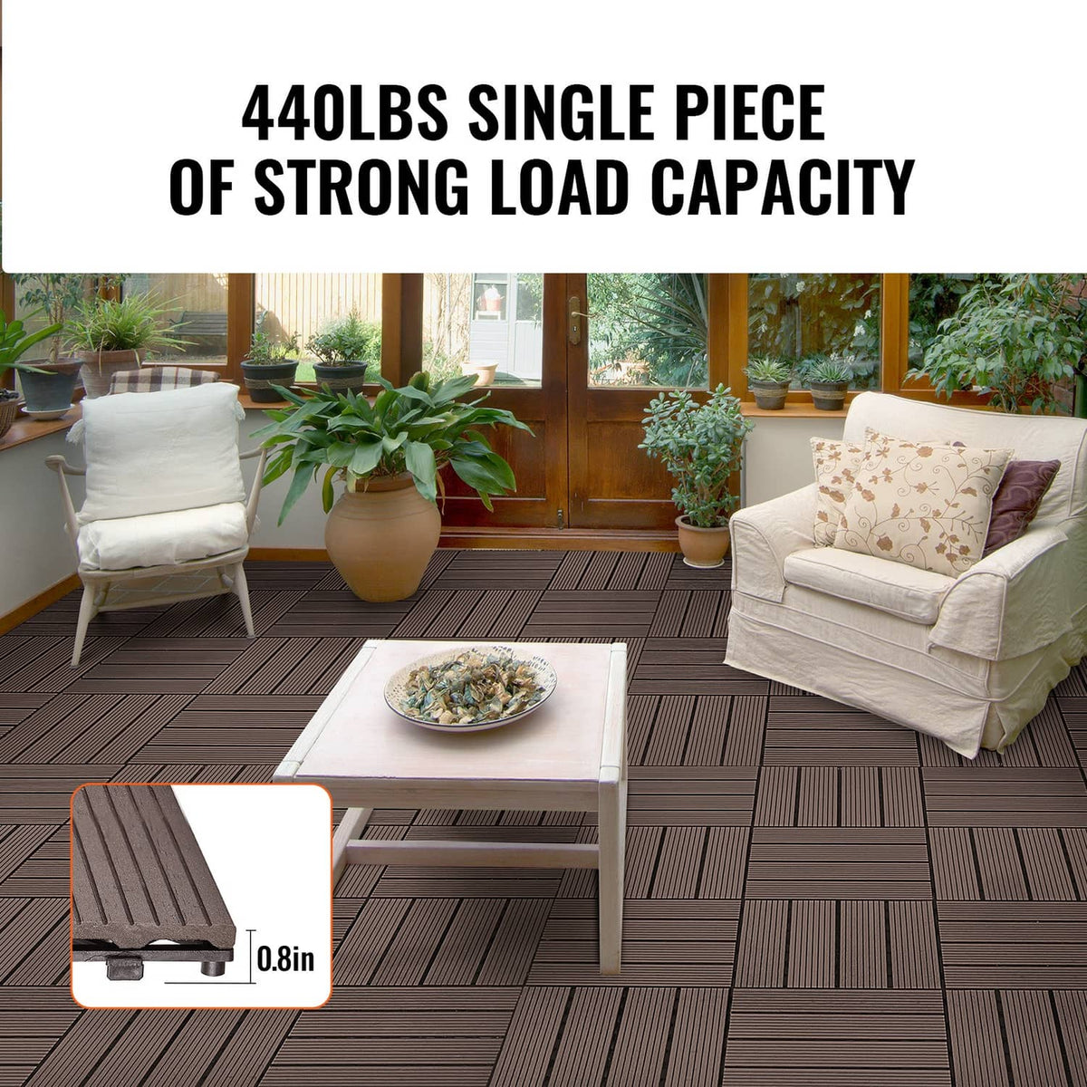 Brown interlocking deck tiles covering outdoor floor around a table and seating