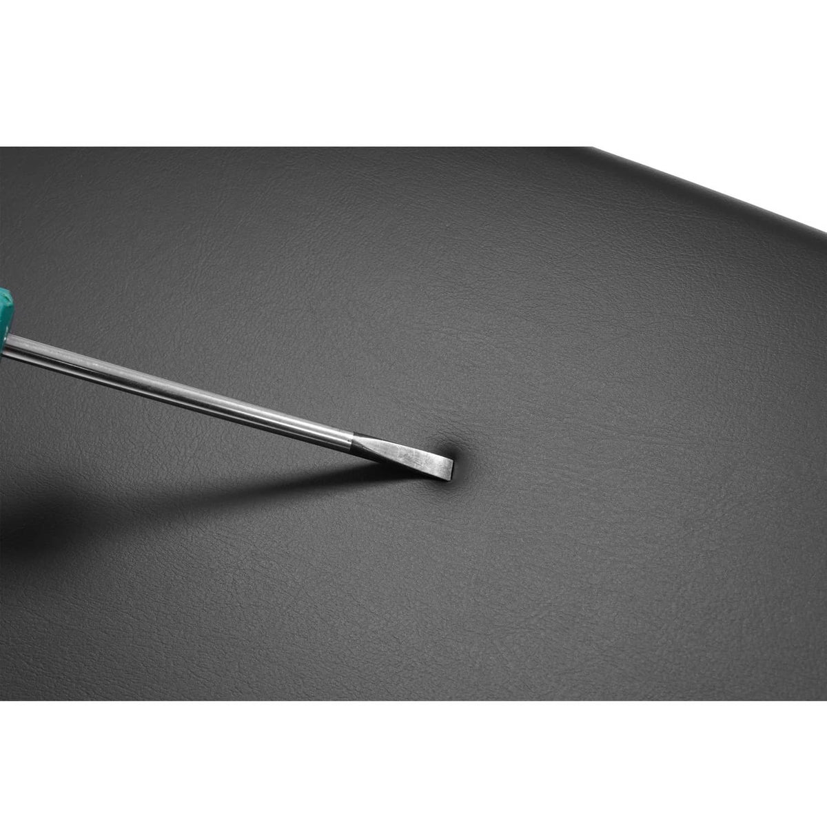 Black cushion surface with silver fastener pin detail