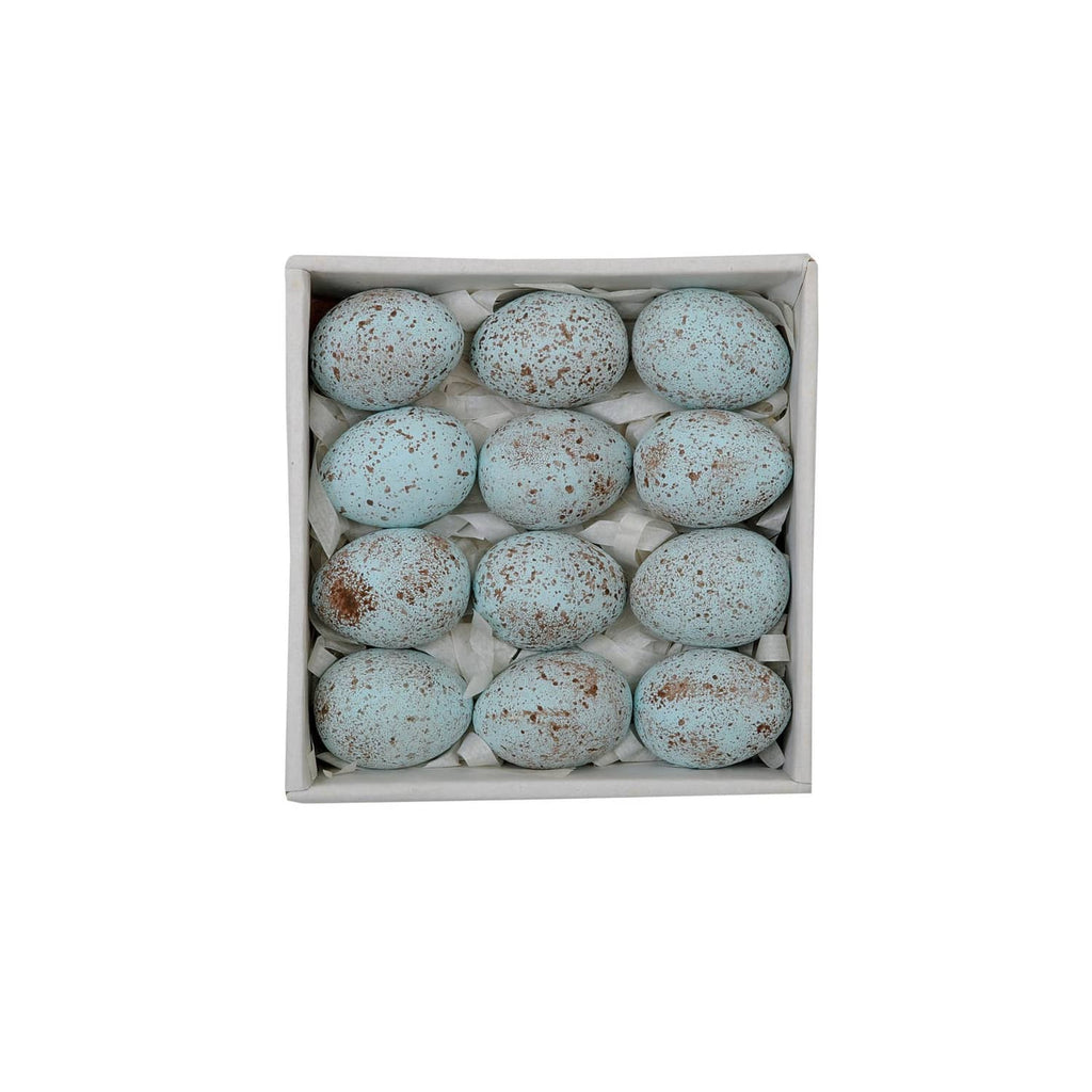 Square gift box filled with blue speckled ceramic eggs