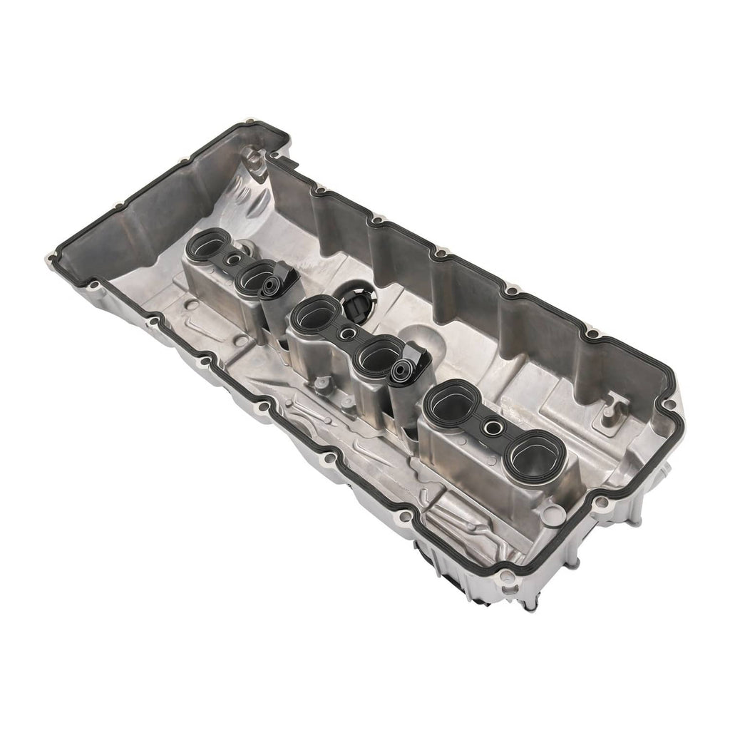 Aluminum engine valve cover underside with molded seals and valve openings