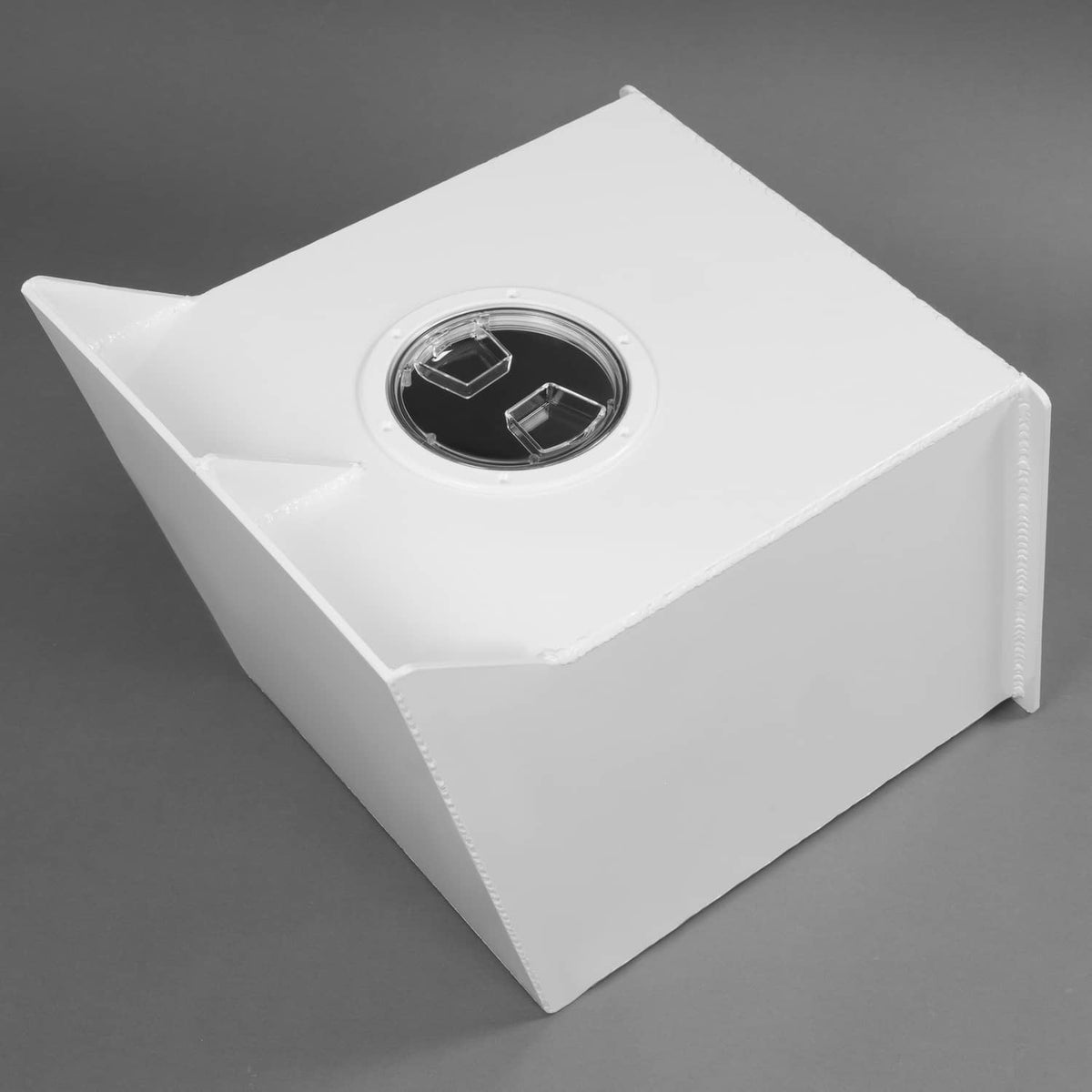 White outboard engine bracket, angled view, with circular motor mount opening.