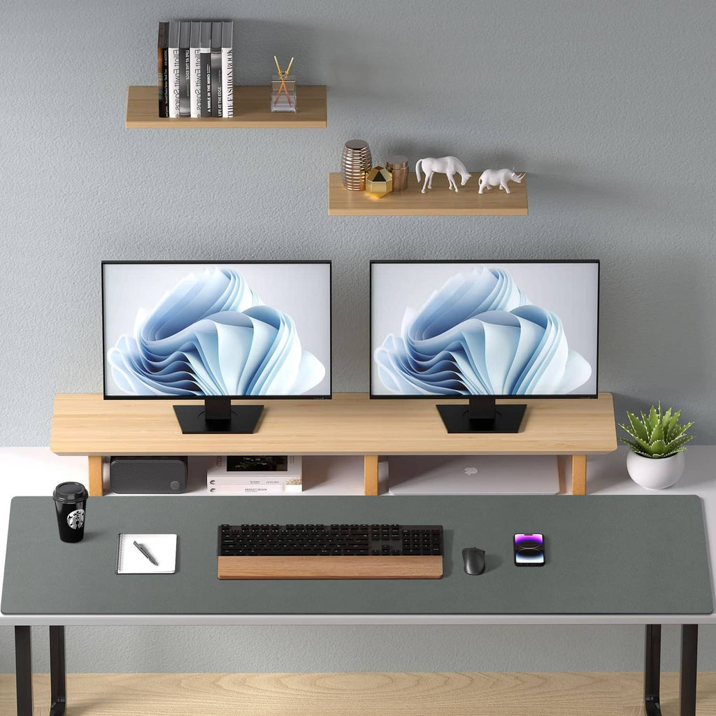 Jungle green leather desk pad protector on a console desk with keyboard