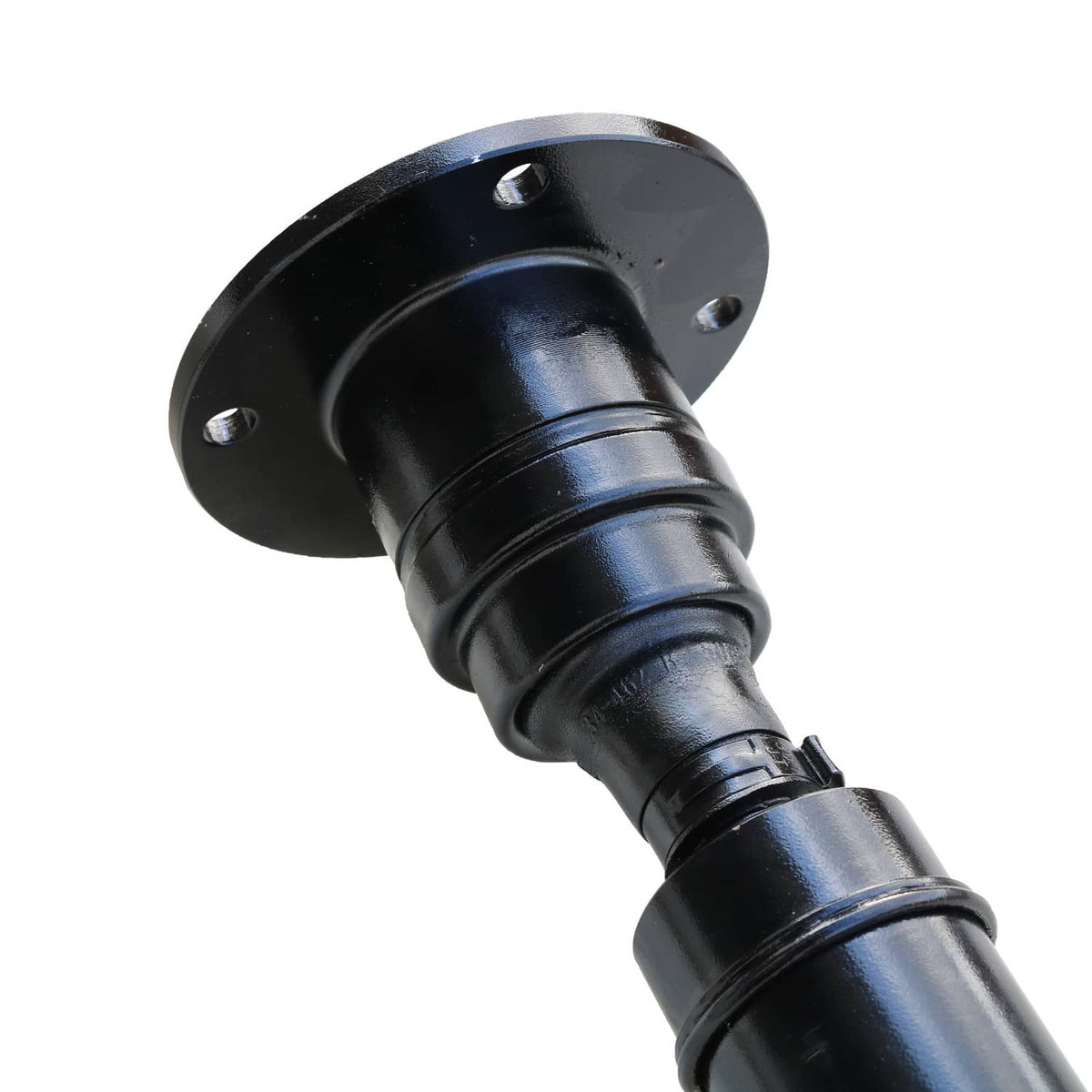 Rear end of driveshaft prop shaft with black collar and bolt holes