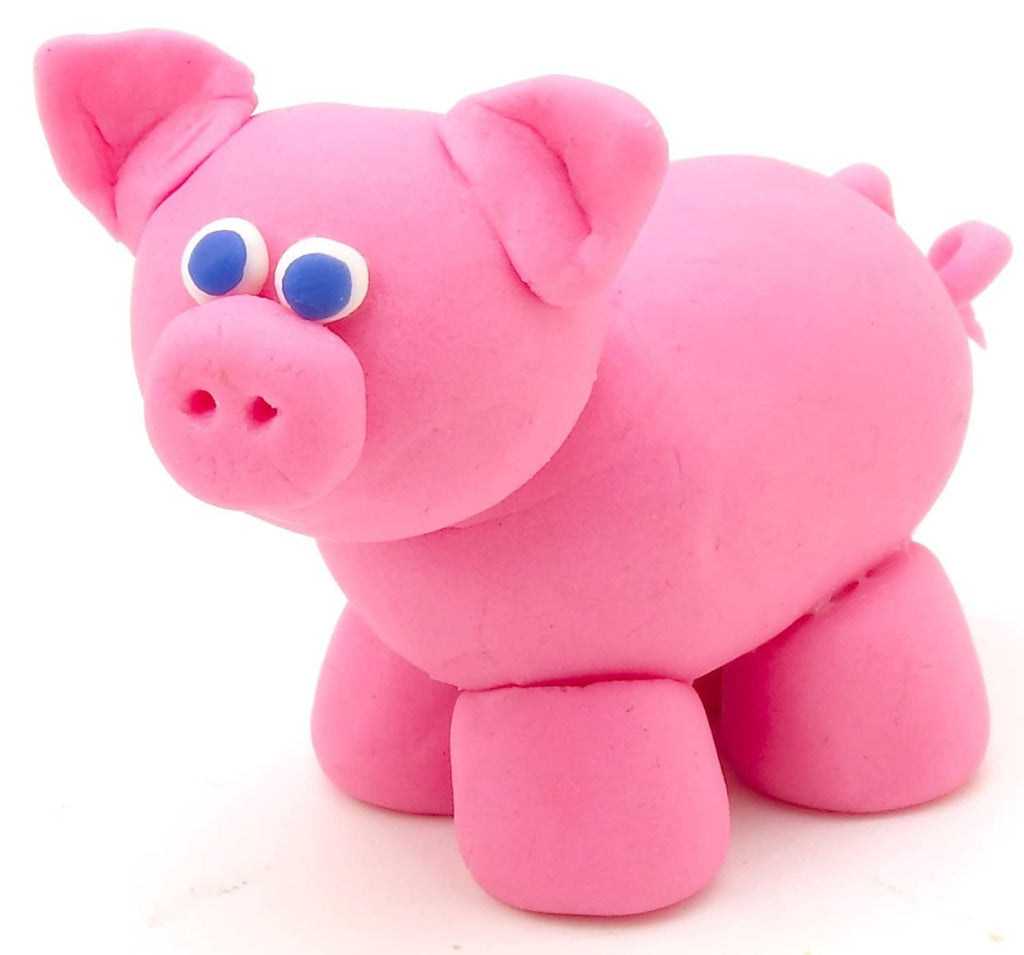 Pink pig-shaped Play-Doh figure with blue eyes and molded details