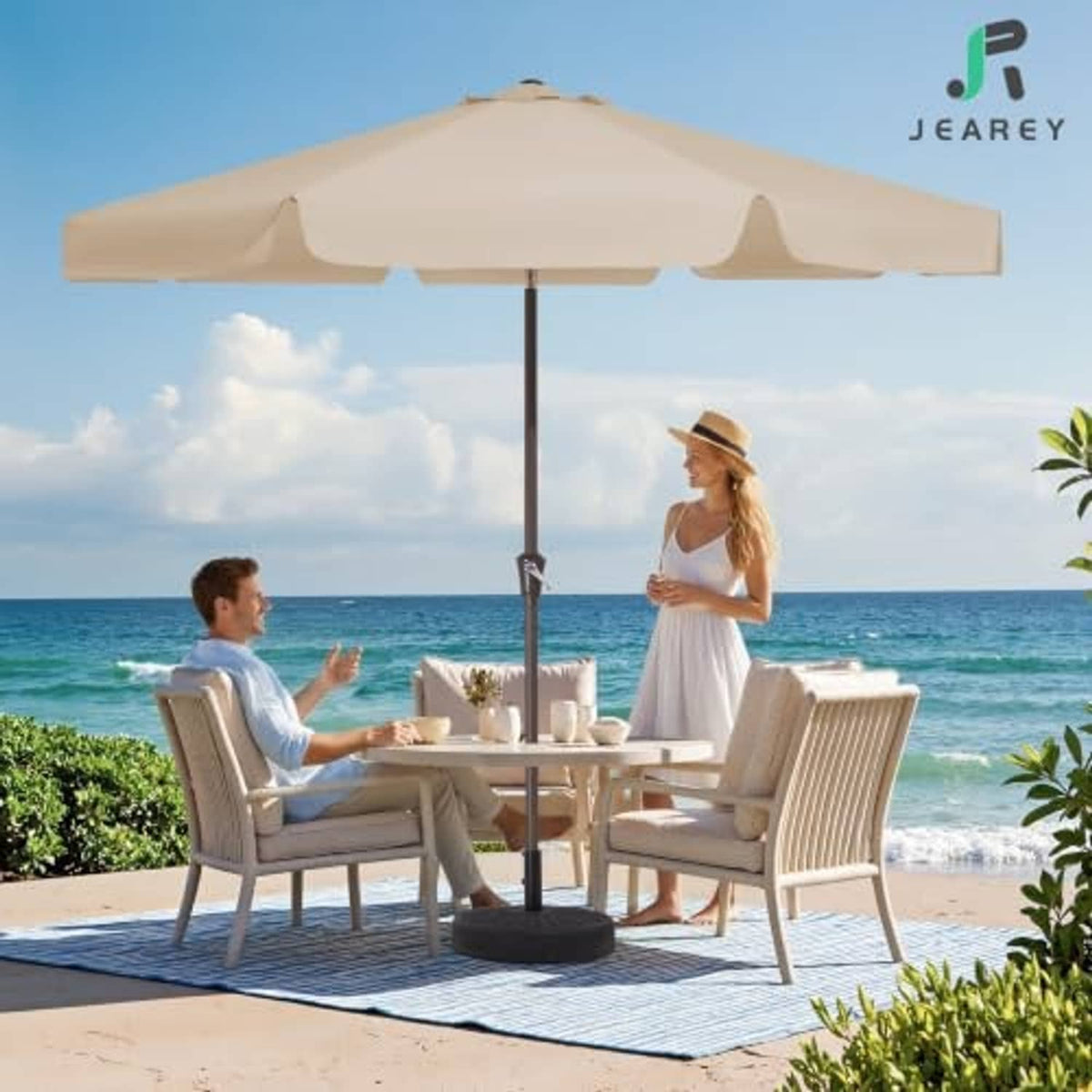 Beige 9 ft patio umbrella with open canopy, center pole, and cross-frame ribs