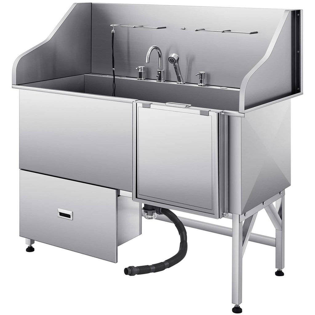 Stainless steel pet grooming tub with ramp and storage cabinet, open faucet controls and hose