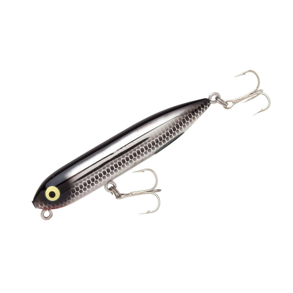 Black and silver fishing topwater lure with two treble hooks and oval eye