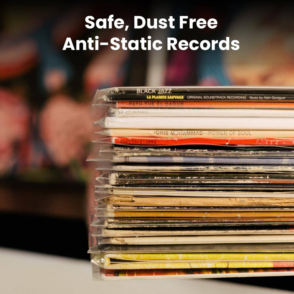 Clear anti-static outer sleeves protecting multiple vinyl records.