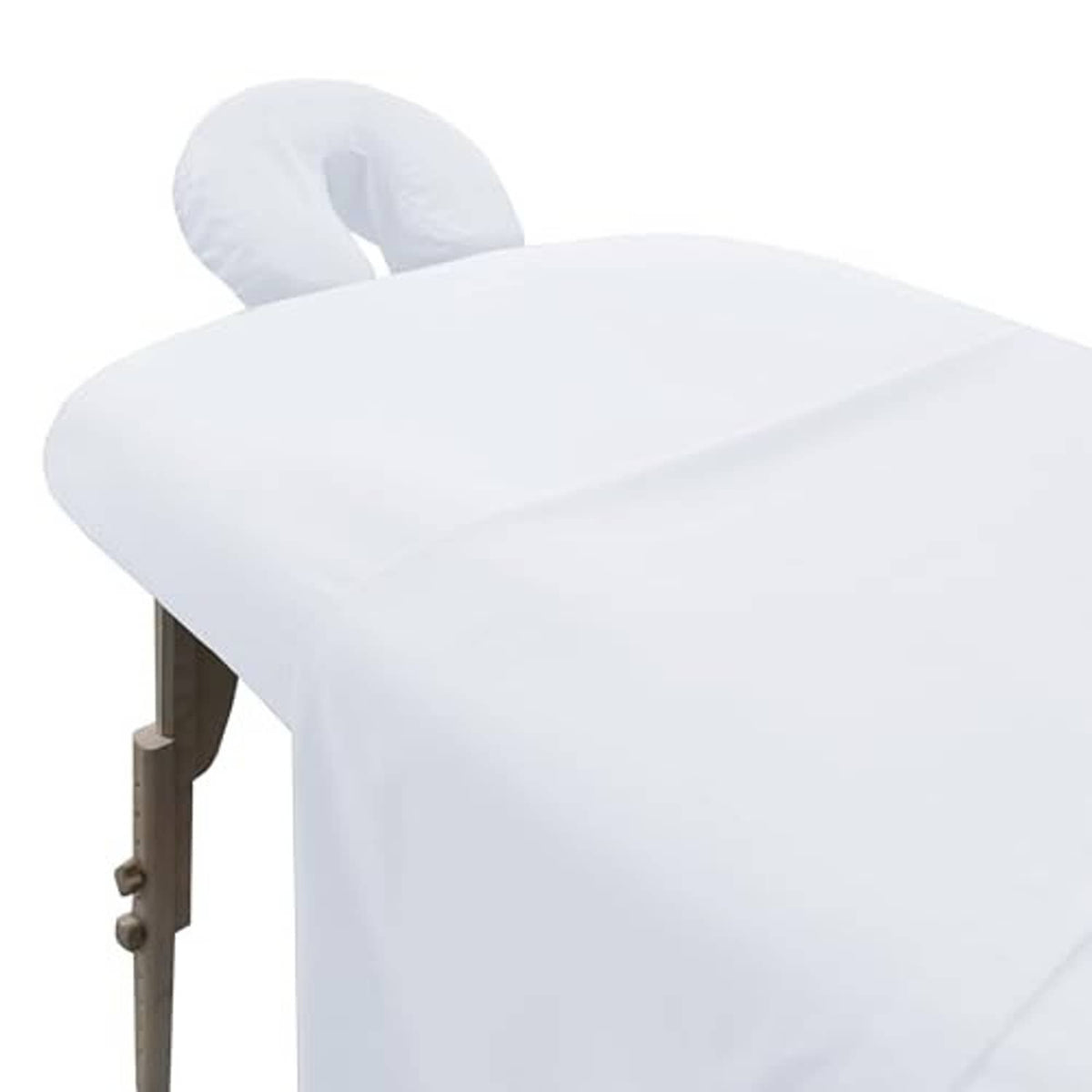 White fitted massage table sheet covering the table surface and headrest