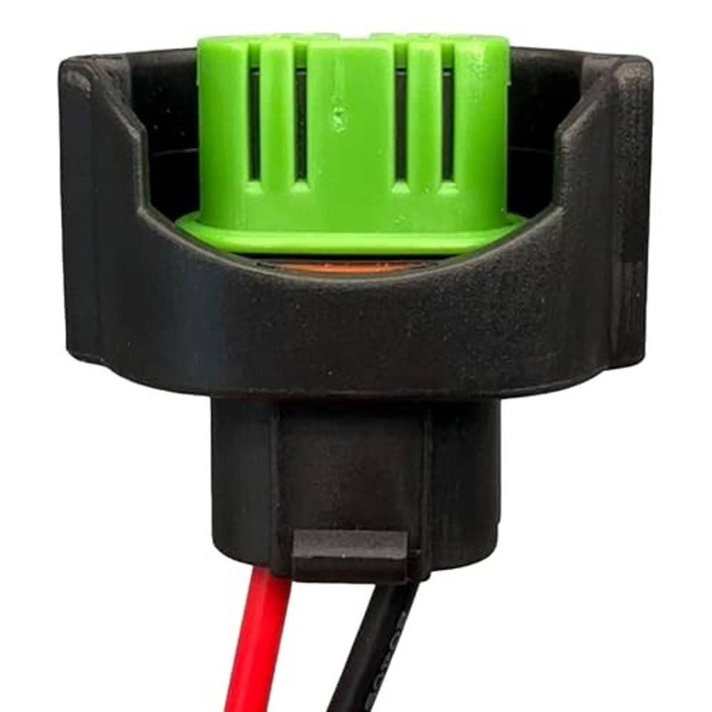 Fog light wiring harness adapter plug with green top insert and red wire lead