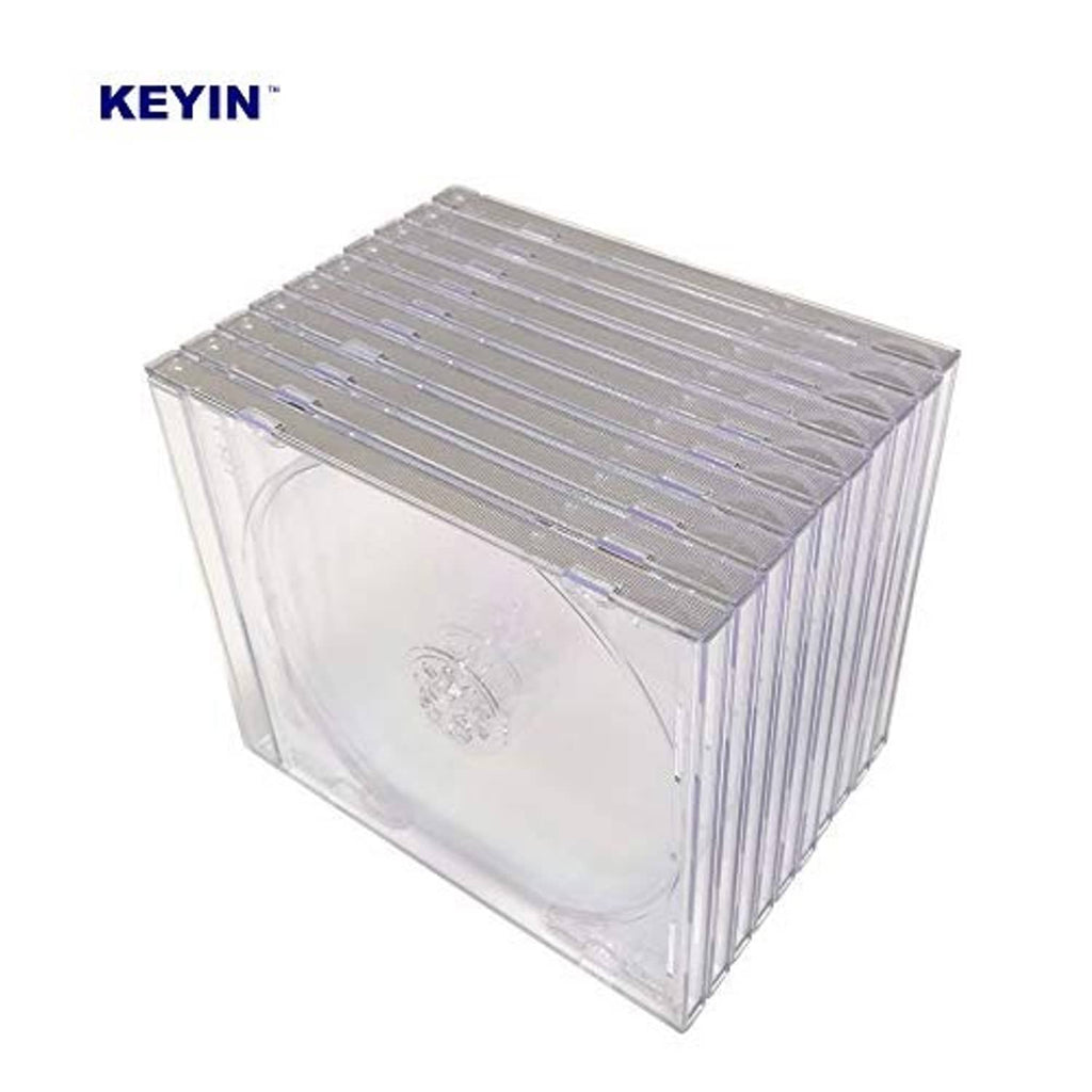 Stack of clear CD jewel cases with ribbed lids and hinged covers.