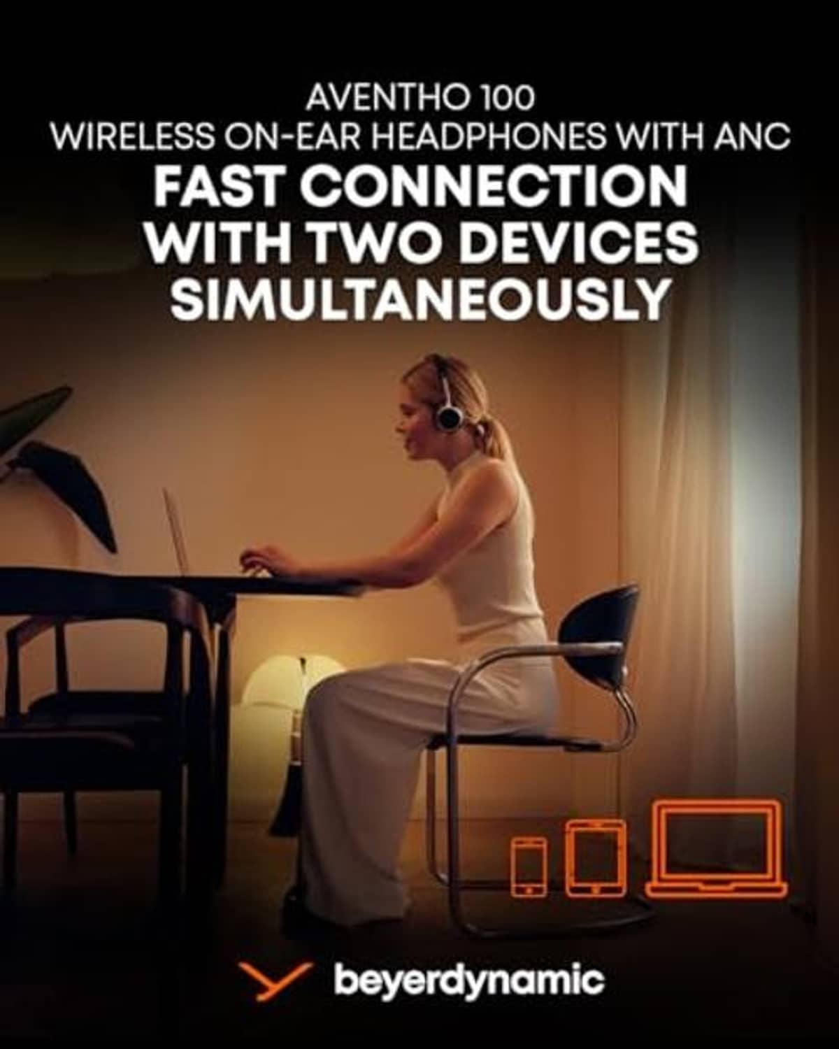 On-ear wireless Bluetooth headphones on a person, brown headband and dark ear cups
