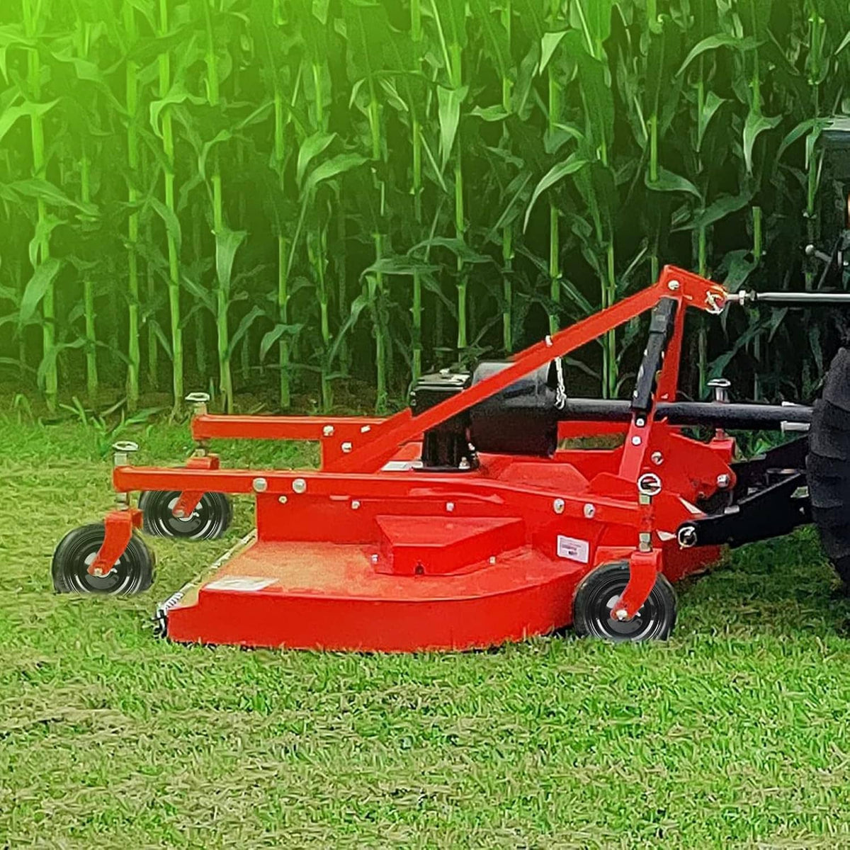 Outdoor mower with black flat-free tires rolling on grass