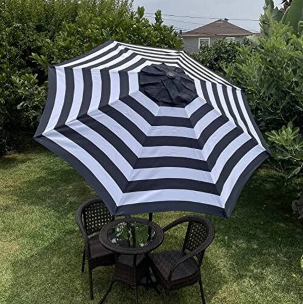 Black-and-white striped umbrella canopy replacement cover with eight ribs and center finial