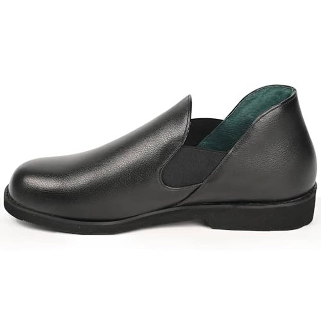 Black leather slip-on slipper with green interior lining and low-profile sole