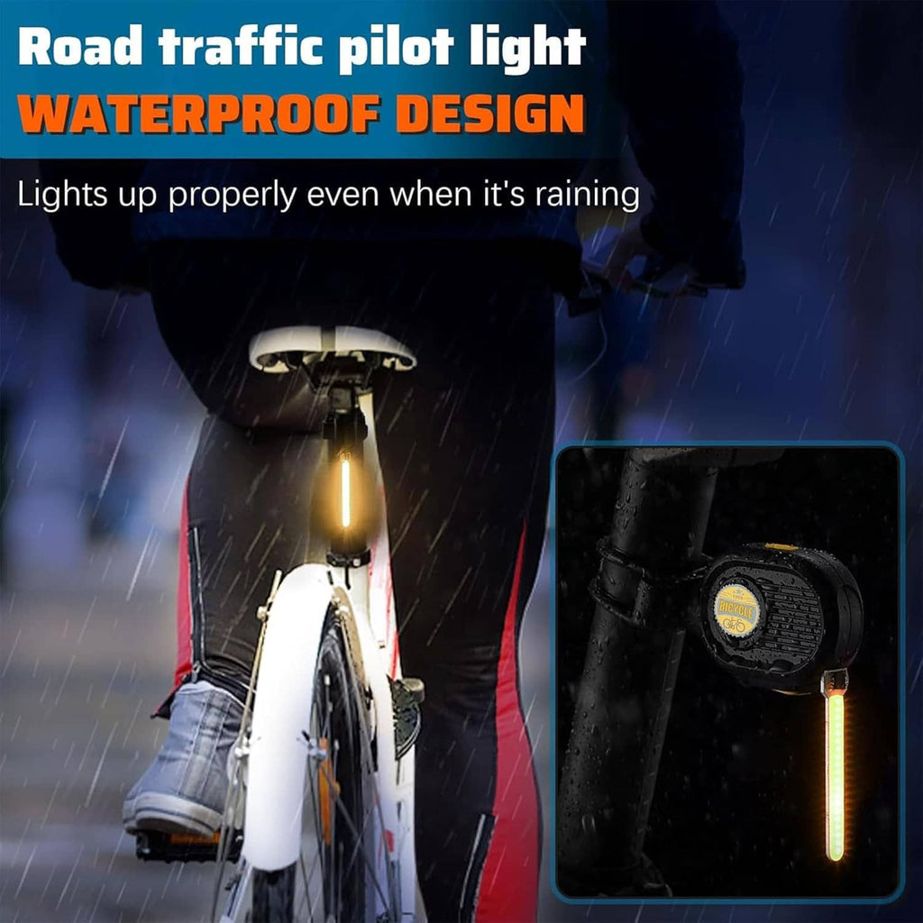 Waterproof LED bike tail light with amber light bar on rear of bicycle