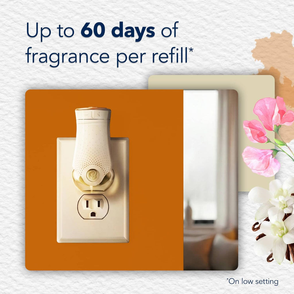 Plug-in air freshener warmer in wall outlet with indicator for low setting