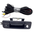 Black tailgate handle backup camera with wiring harness and exposed connector