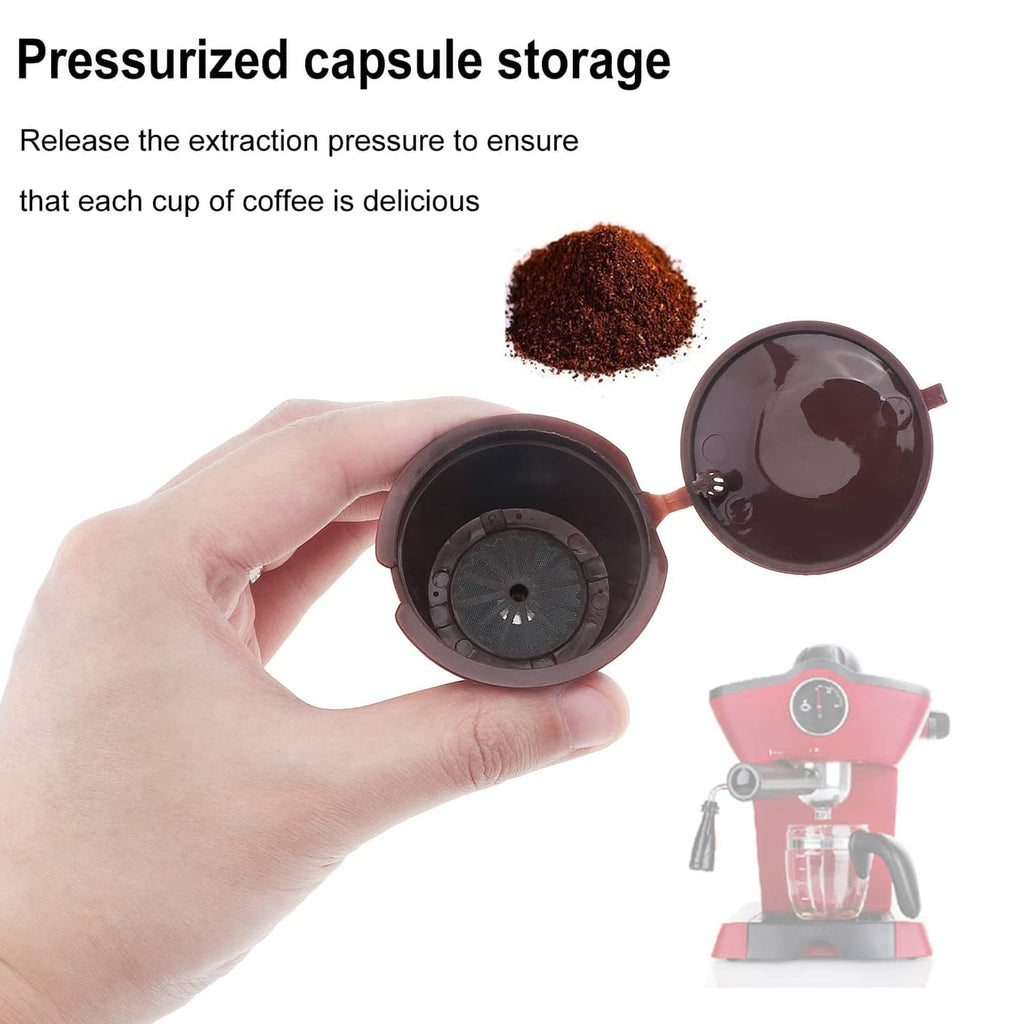 Dark brown reusable coffee capsule with open filter chamber held in a hand