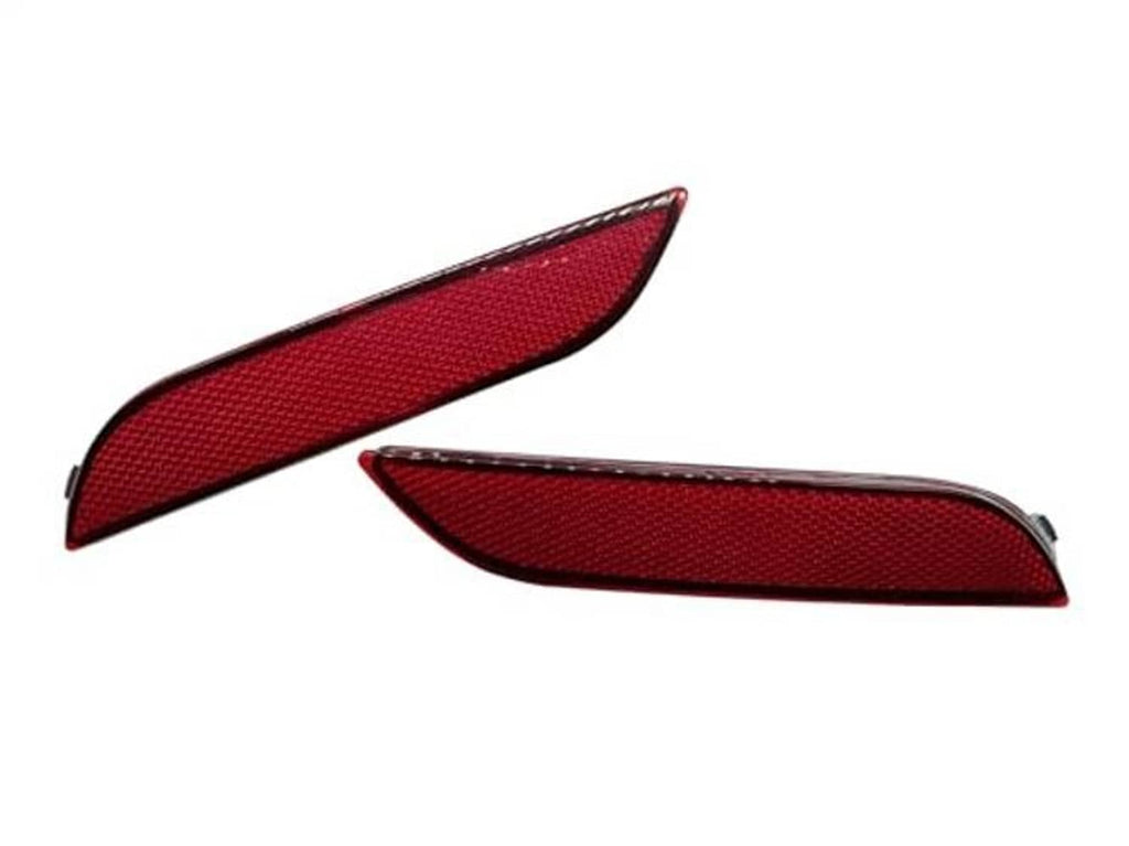 Red rear bumper reflector lenses with black trim, angled view