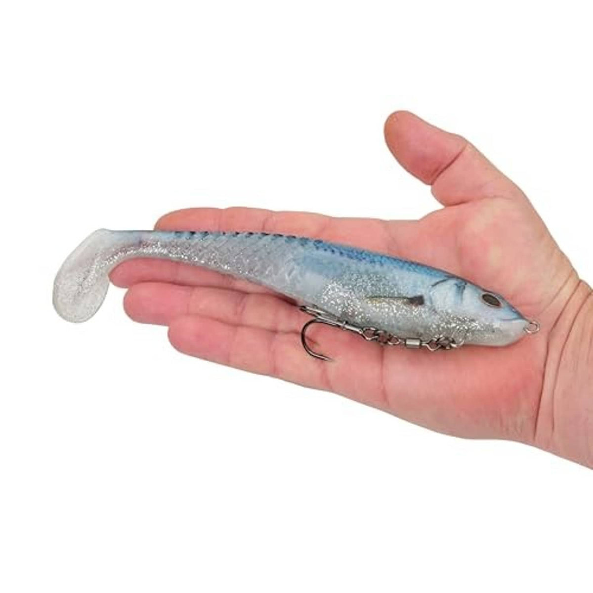Blue shad soft swimbait lure held in hand with treble hooks