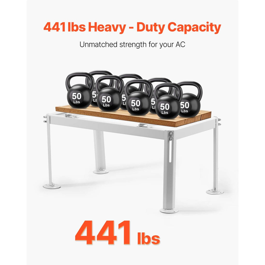 White heavy-duty mini split ground stand holding an outdoor unit with weights on top