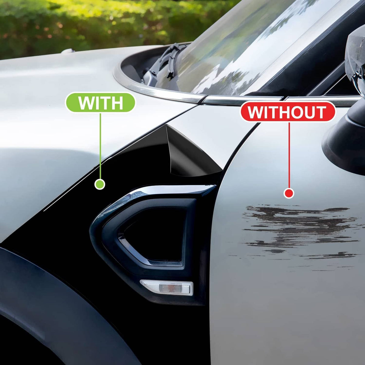 Gloss black vinyl wrap on a car headlight and front quarter panel