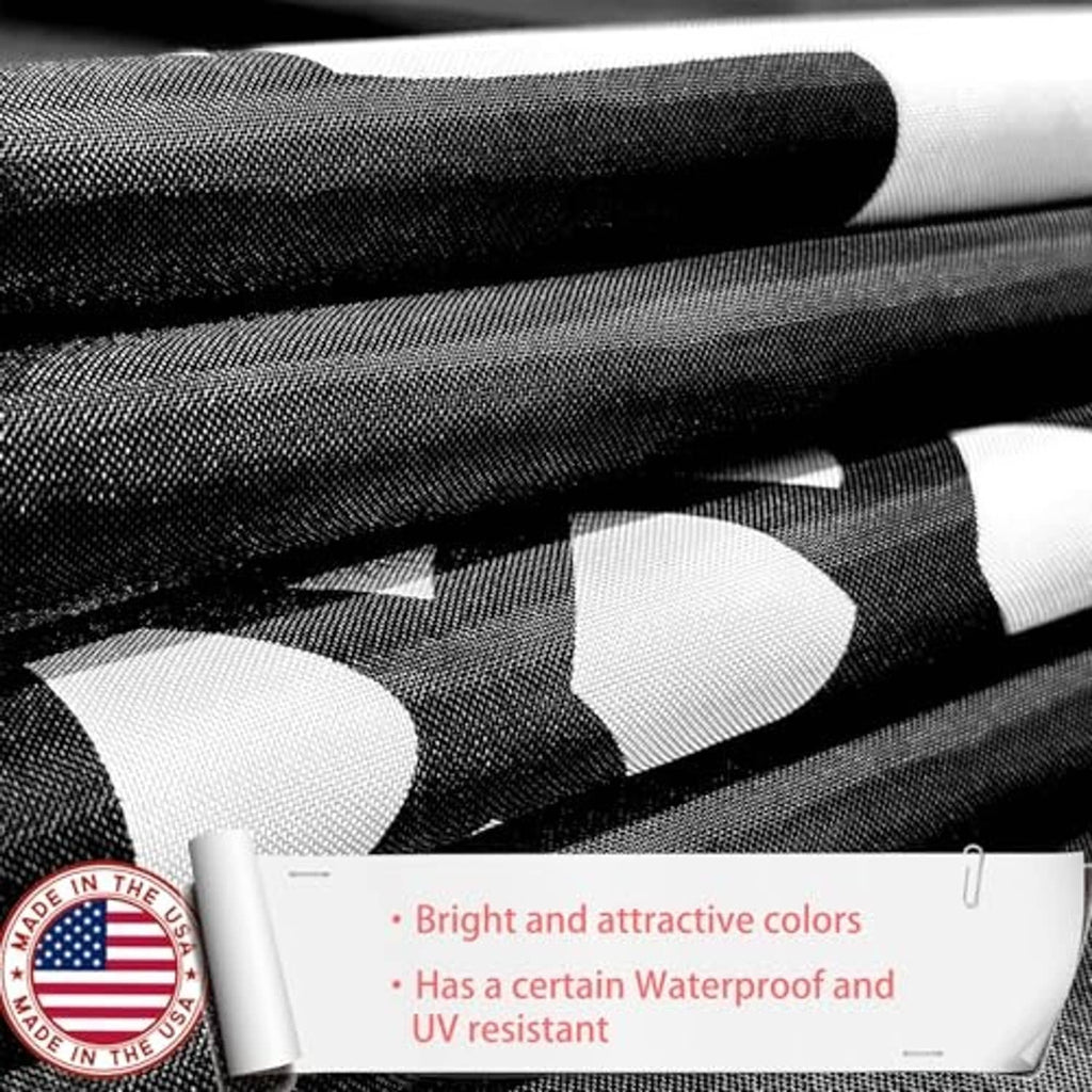 Close-up of black nylon flag fabric with printed POW-MIA style emblem