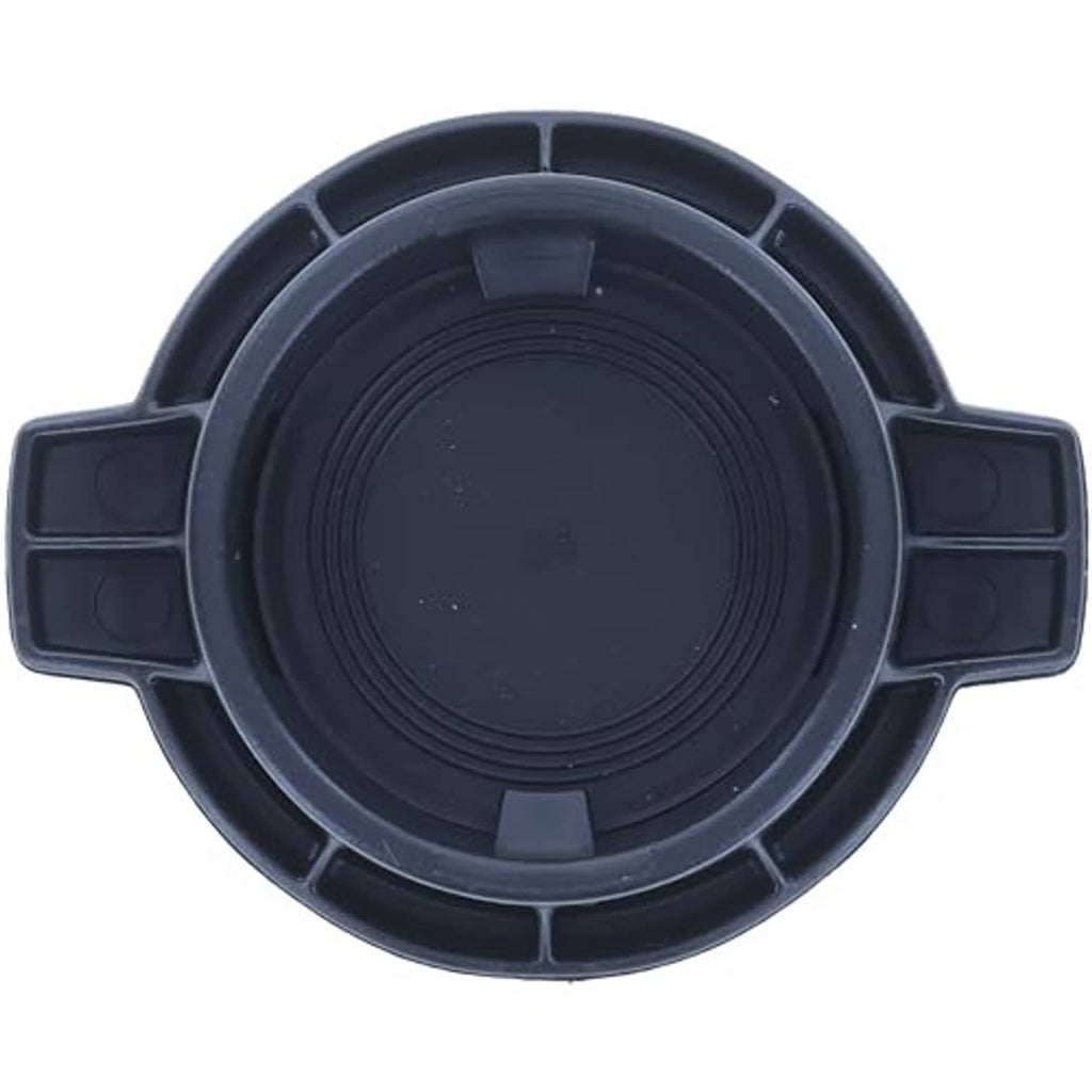 Engine coolant reservoir cap, underside view with circular seal area and four support tabs.