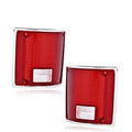 Red tail light set with clear white reflector inside chrome-trimmed housings.