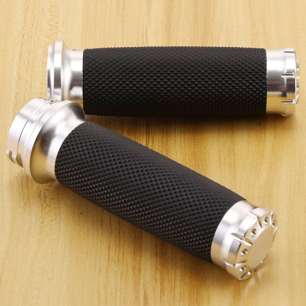 Pair of motorcycle handlebar grips with black textured rubber and chrome ends
