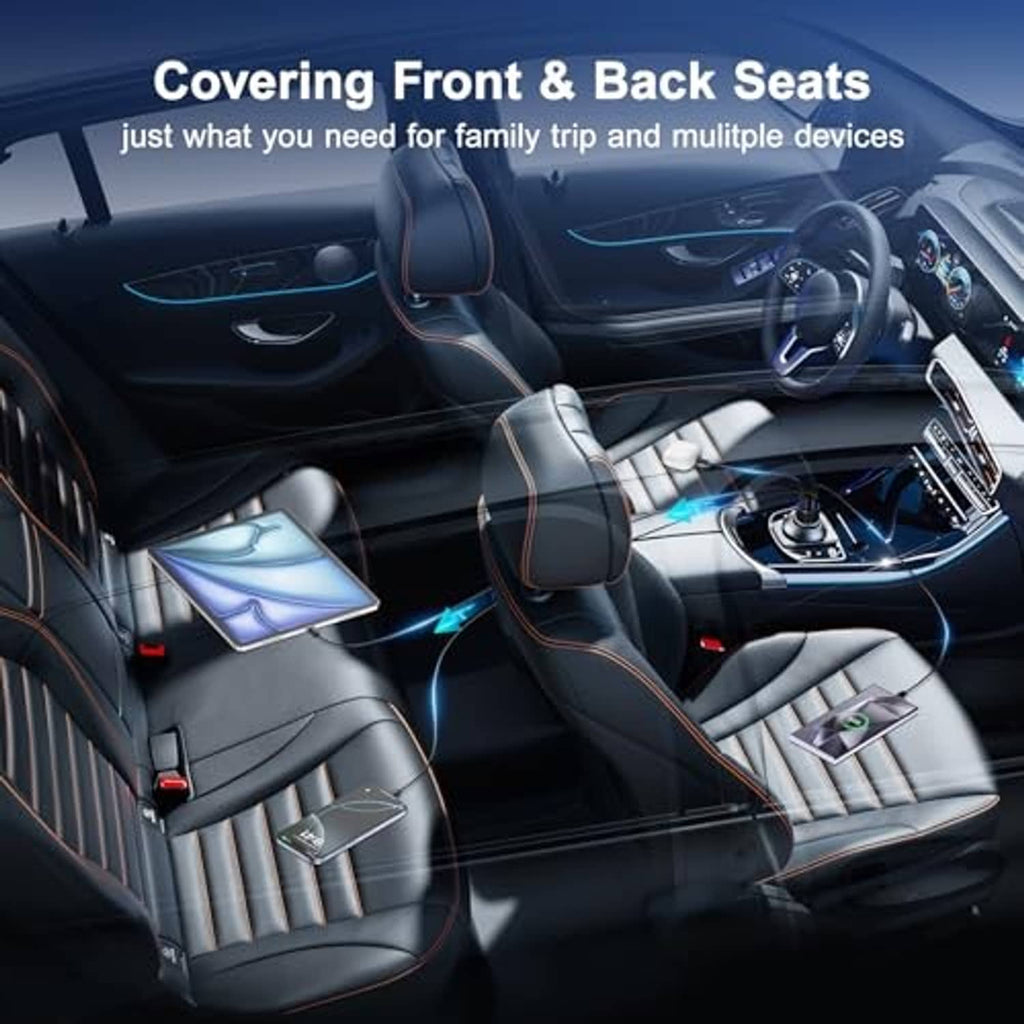 Car interior with black multi-port USB charger mounted near the center console, cables visible.