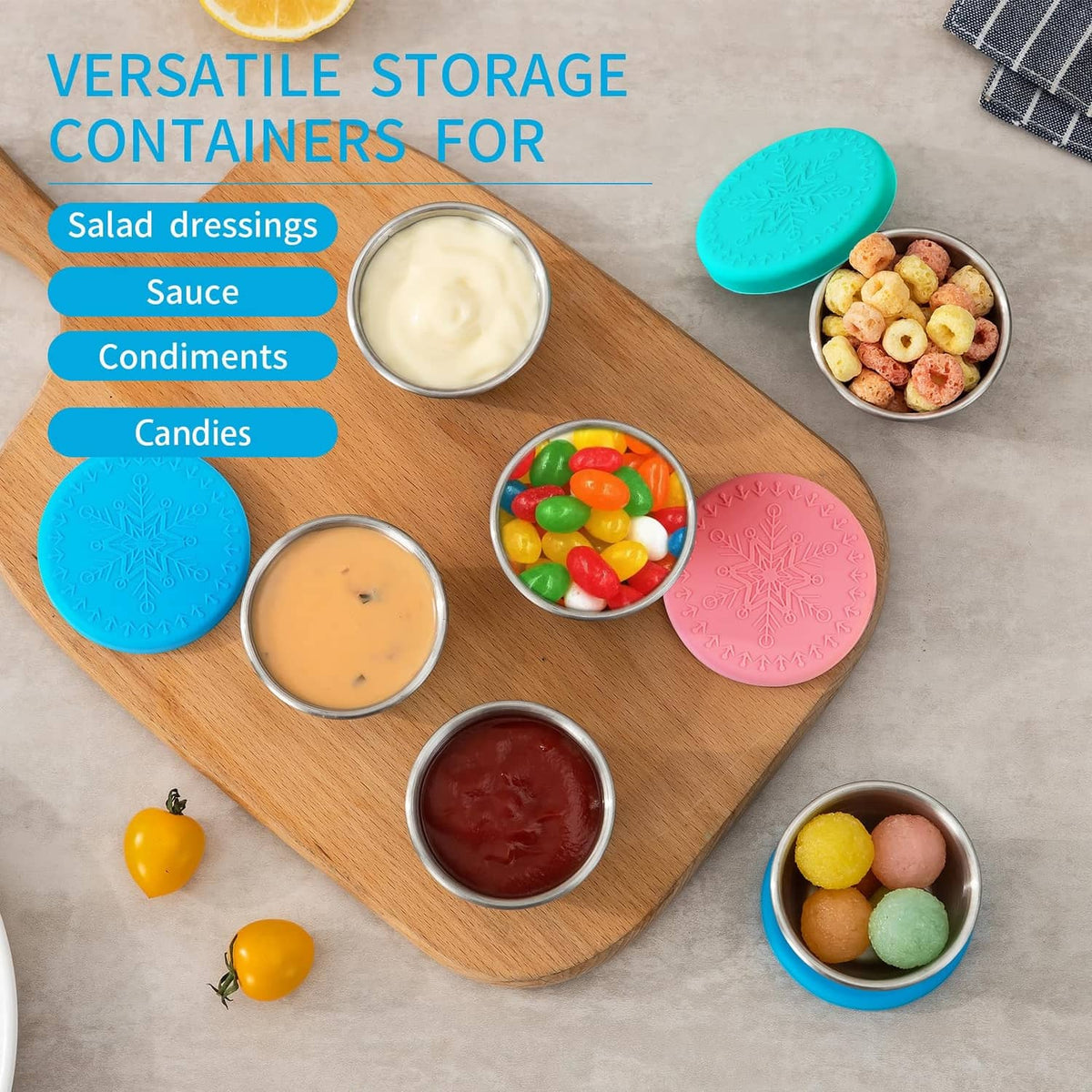 Stainless steel storage cups with blue and pink silicone lids for dressings and sauces