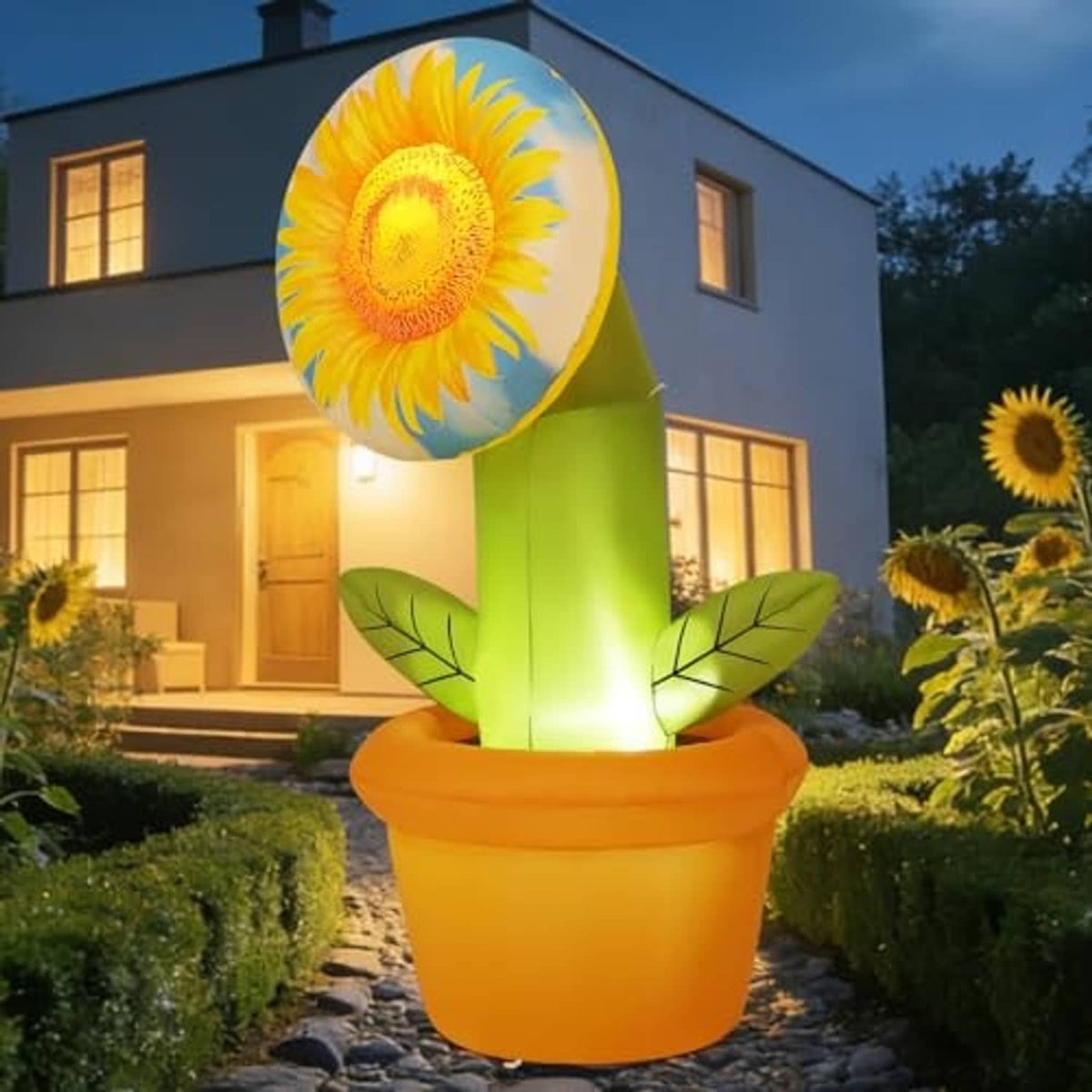 Illuminated inflatable sunflower with yellow flower head, green stem, orange pot, and leaves