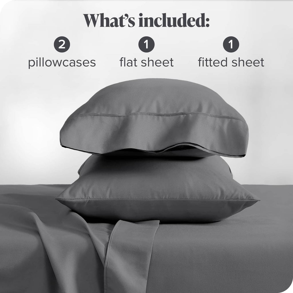 Grey microfiber 4-piece bed sheet set showing pillowcases and folded sheets