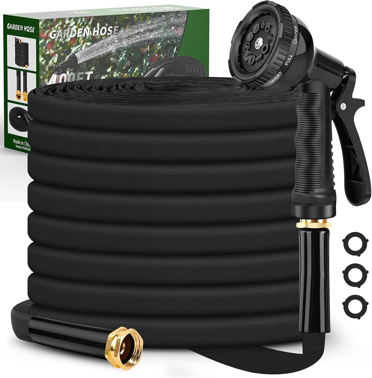 Black coiled garden hose with black handle sprayer, brass connector, and extra hose parts
