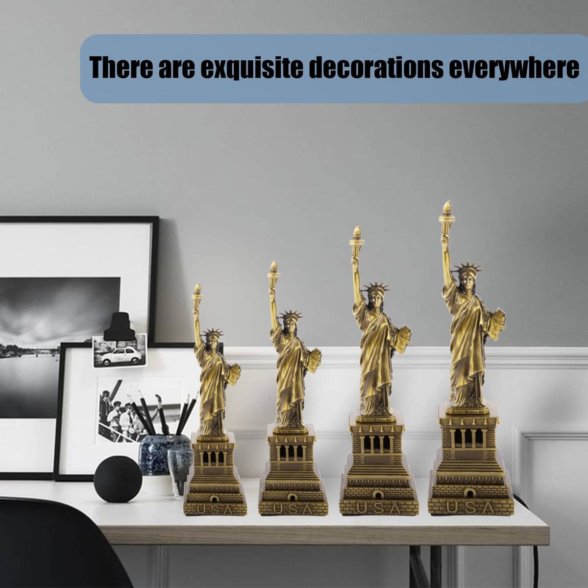 Set of bronze Statue of Liberty metal figurine souvenirs on display with bases