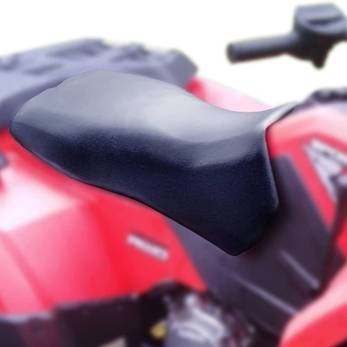 Black rider seat cushion for ATV, contoured top and smooth finish