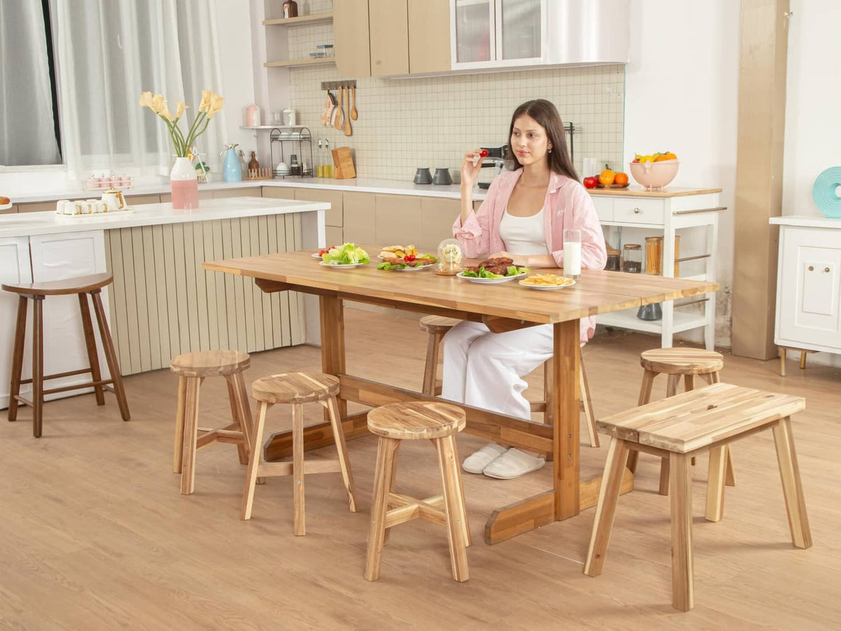 Set of acacia wood round stools with smooth tops and angled legs