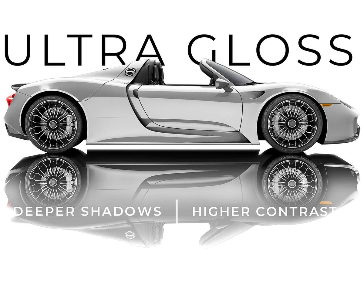 Silver metallic car wrap sample on a sports car, ultra gloss look