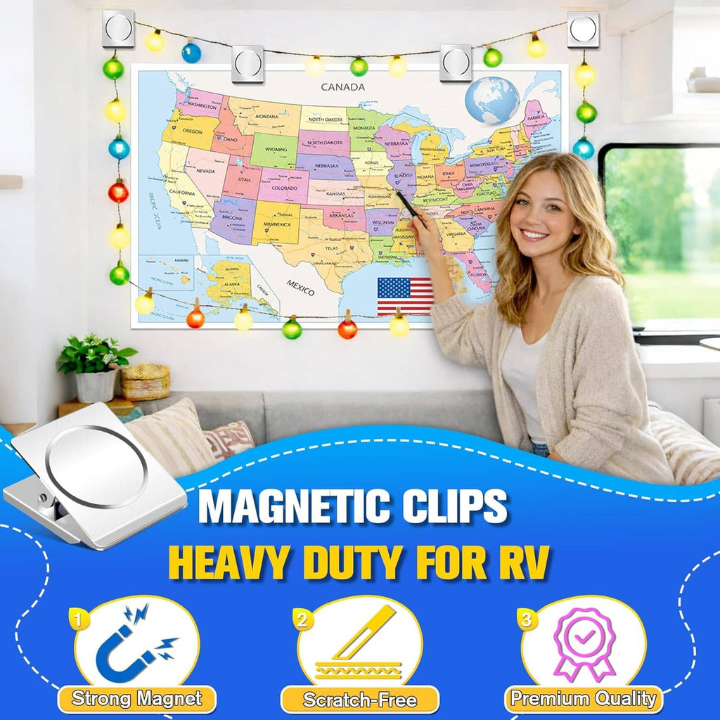 Two silver magnetic clips holding a map on a wall; rounded magnet covers visible