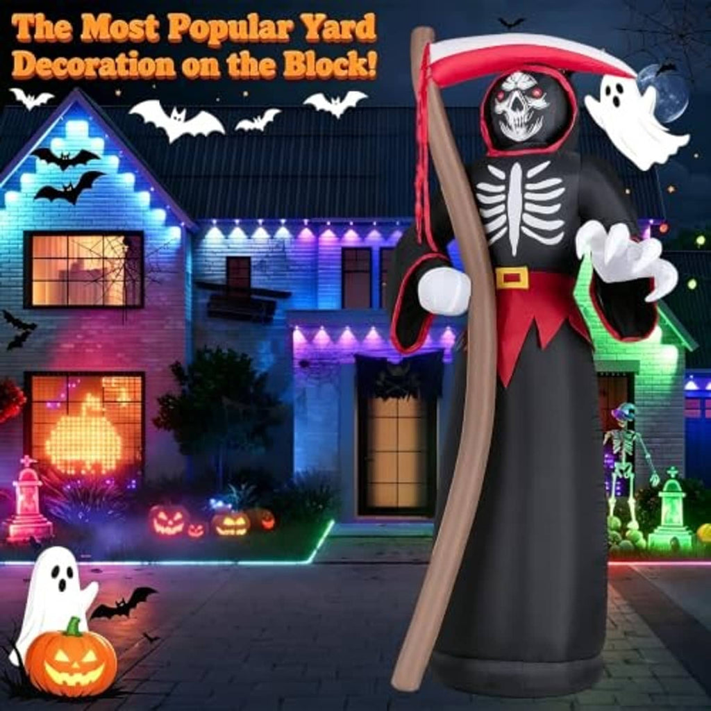 Outdoor inflatable grim reaper figure with red hood, black robe, white skeleton face, gray staff