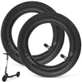 Black pneumatic scooter inner tubes, two with valve stems and metal fittings