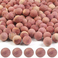 Natural aromatic cedar blocks, round wooden discs in mixed pink-brown tones.
