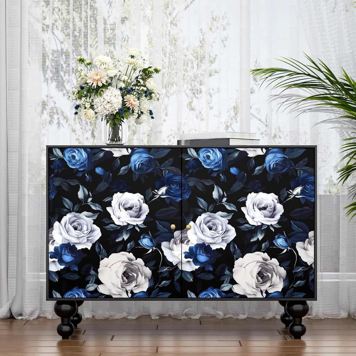 Peel-and-stick floral wallpaper sheet with blue and white roses on dark background
