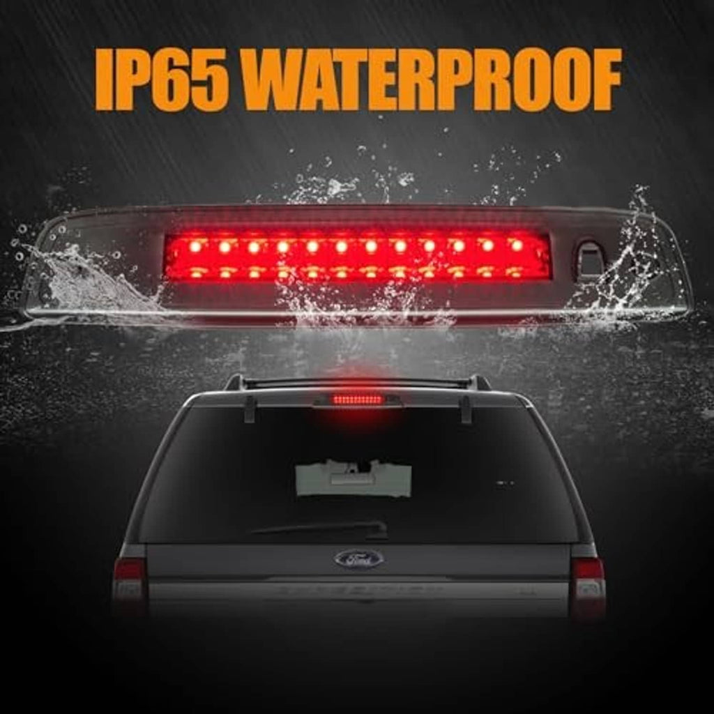 Rear-mounted third brake light LED assembly glowing red on a vehicle