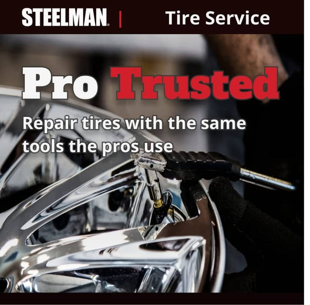 Metal tire service tool on car wheel with visible handle and clamp