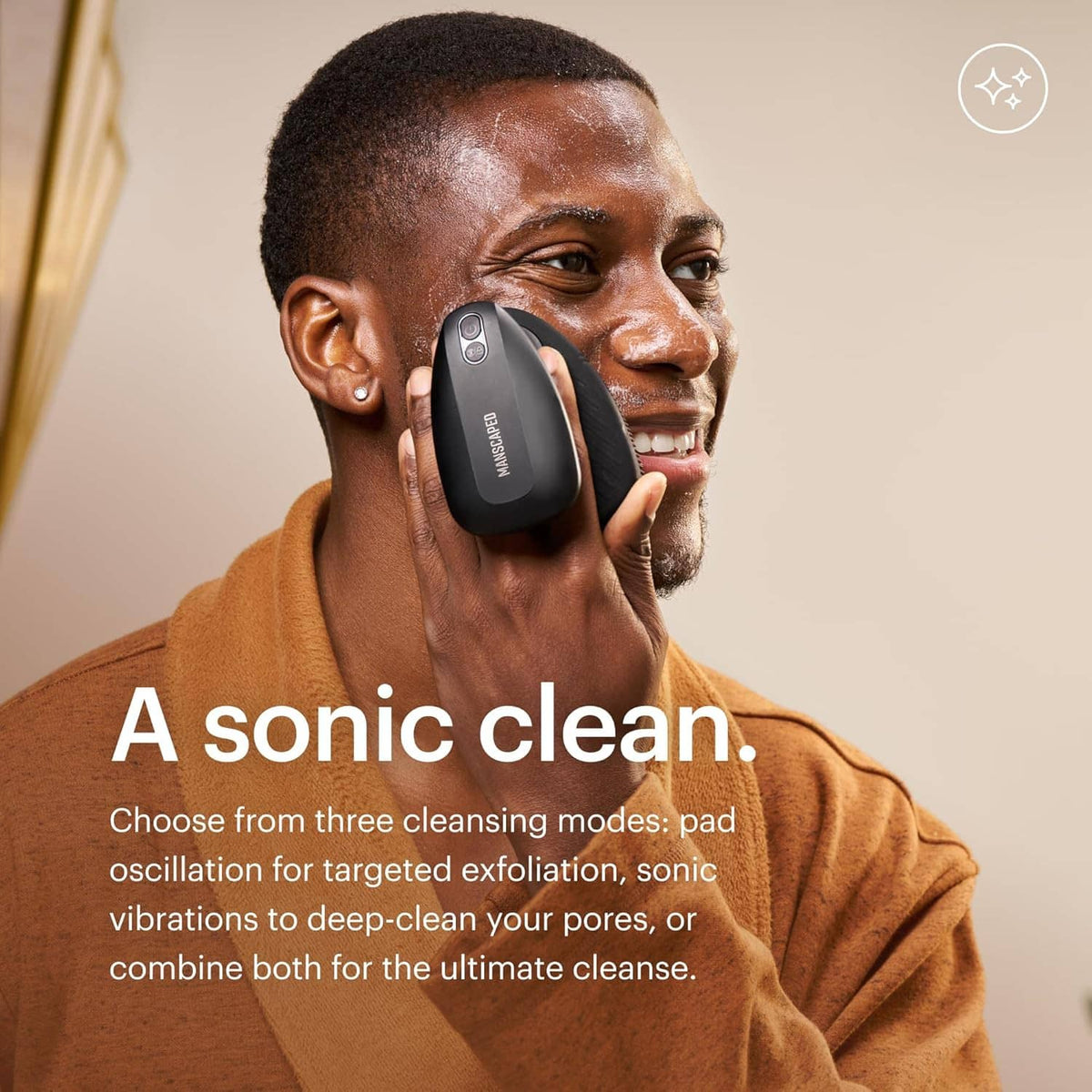 Men using electric silicone face scrubber on cheek with handheld device